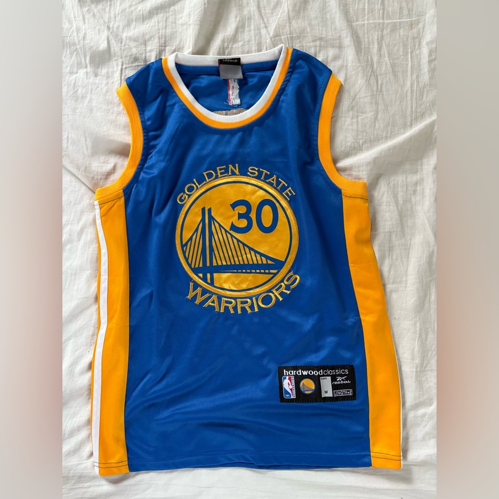Steph Curry Reebok Kids Blue and Yellow Warriors Jersey